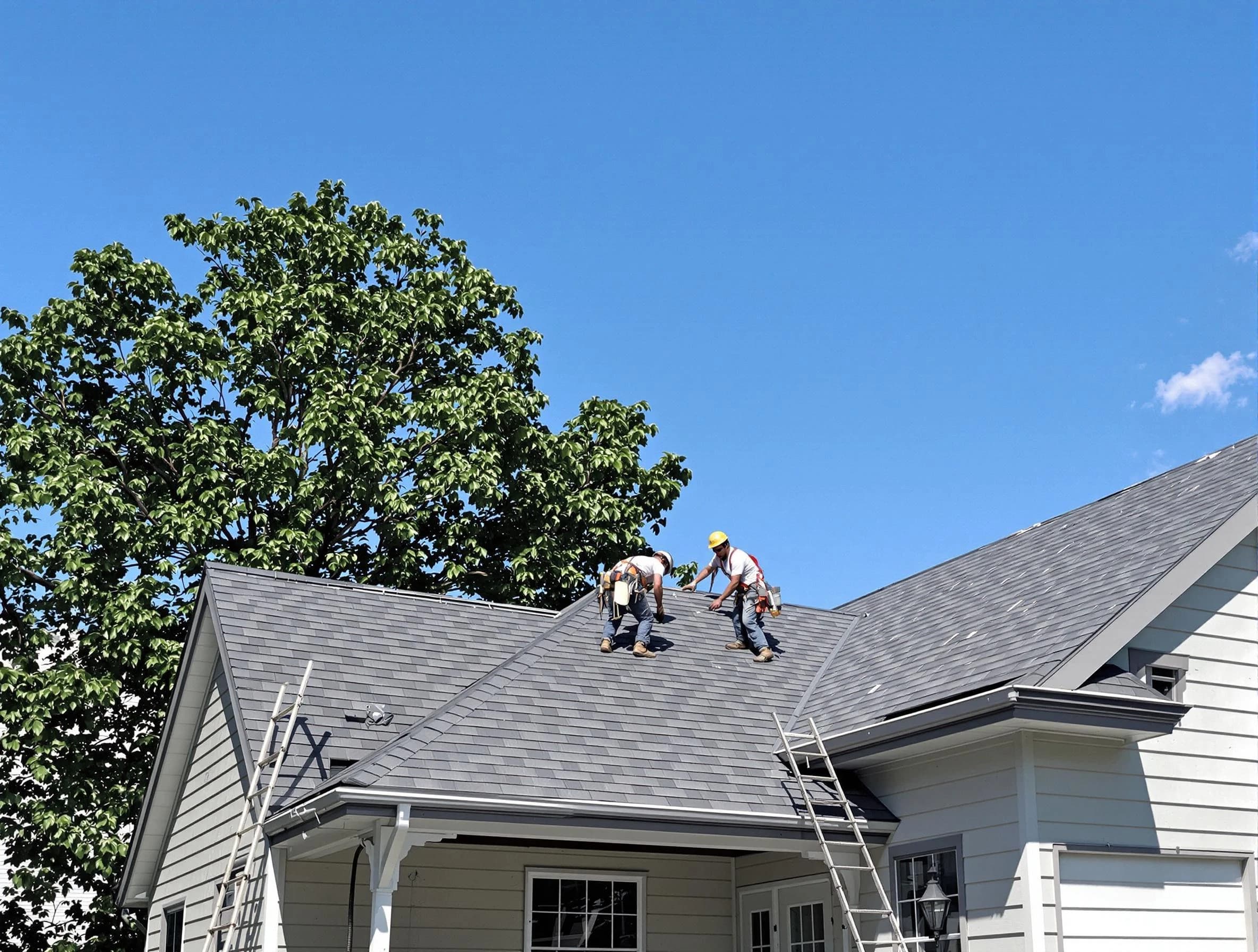 Lorain Roofing Company crew finalizing a roof installation in Lorain, OH