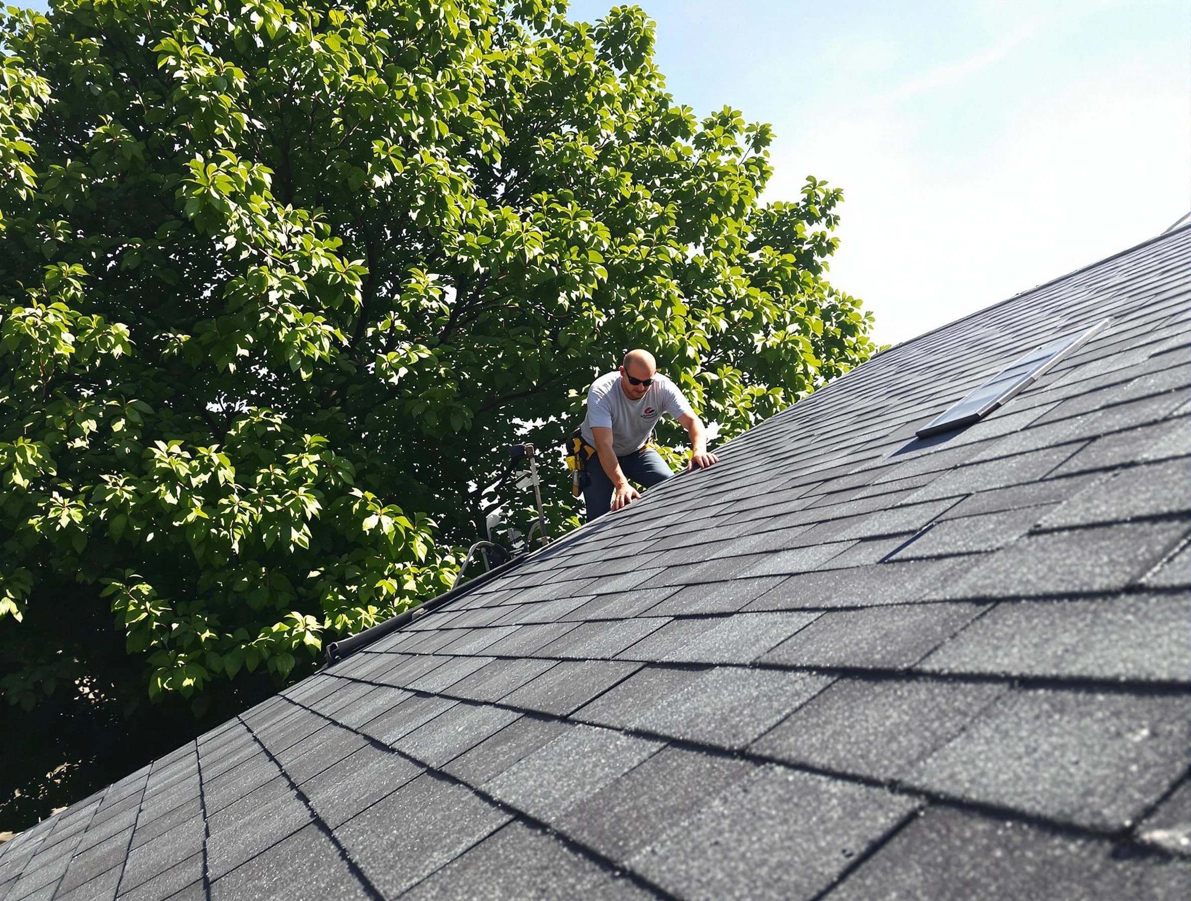 Certified roofers from Lorain Roofing Company working in Lorain, OH